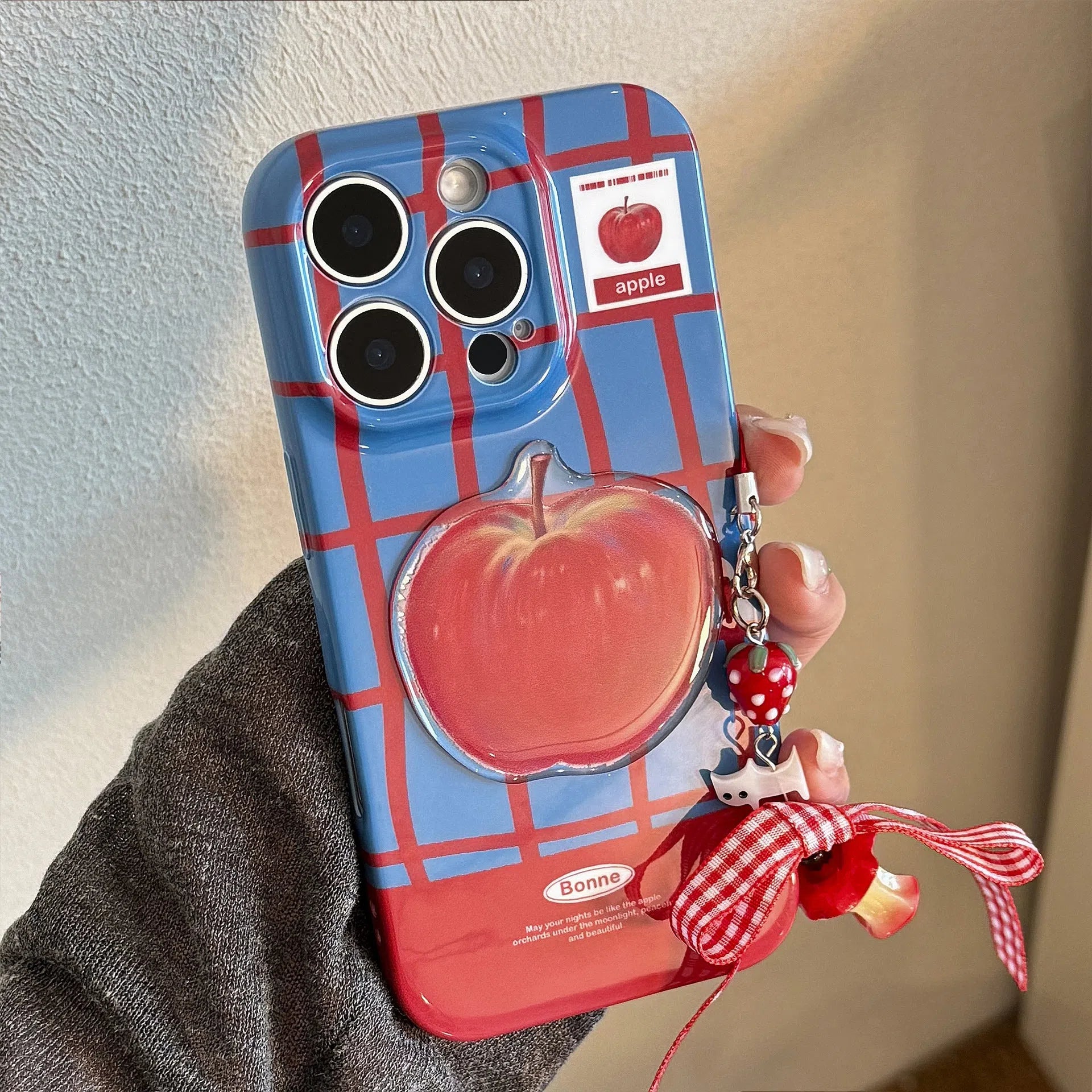 Full-coverage 3D checkered phone case with fruit pattern in Film Blue Red Grid colour, soft shell variant with little cat pendant.