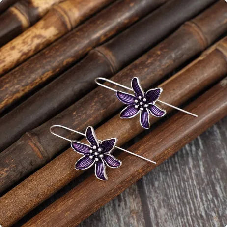 Purple flower-shaped alloy earrings with electroplated finish and retro styling