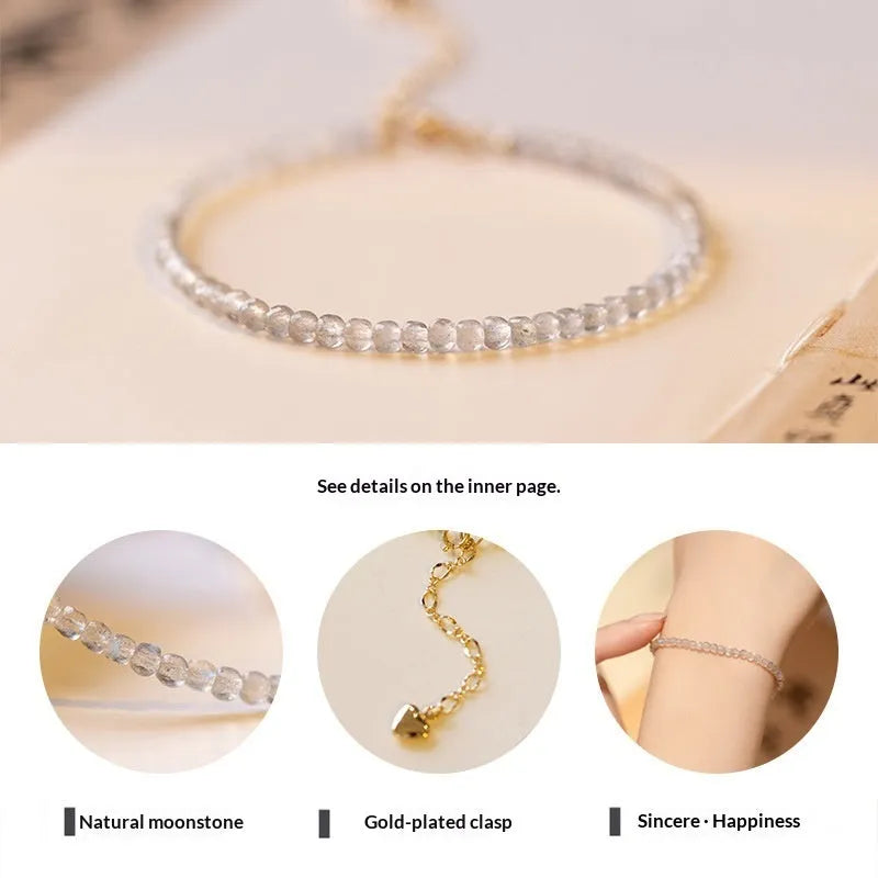 Natural gray moonstone diamond-shaped beads on a silver bracelet with clasp