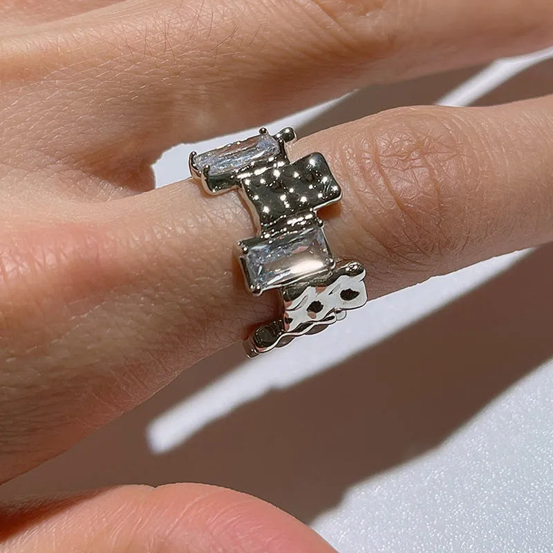 Open geometric silver ring with cross zircon pattern in retro style