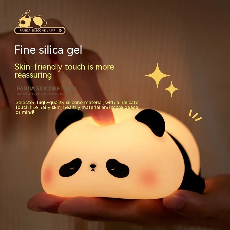 Cartoon panda head night light with silicone construction and warm white glow