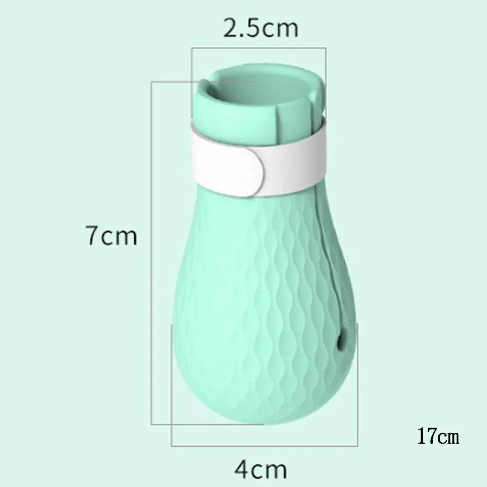 Set of four green silicone cat paw covers designed as anti-scratch gloves for pet washing and medication