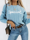 Blue crew neck pullover sweater with embroidered letters design on the chest.