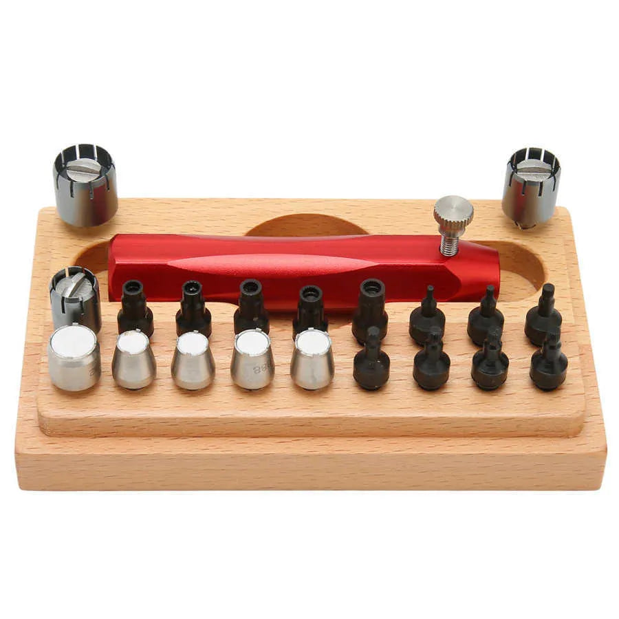 Open case showing steel watch repair tools including barrel opener, punch pliers, and 20 screwdriver bits.