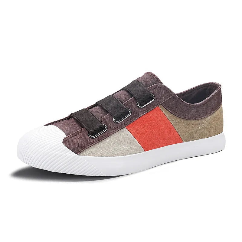 Men's low-top canvas sneakers in beige with elastic band closure and vulcanised rubber sole.