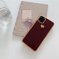 Solid colour blue TPU iPhone back cover case shown next to a claret pink and green version.