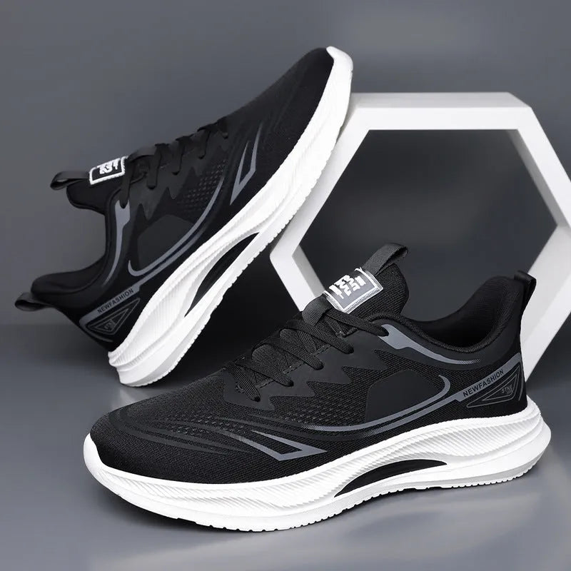 Men's low-top casual shoes in fly woven mesh, showing round toe and rubber sole, in black colourway.