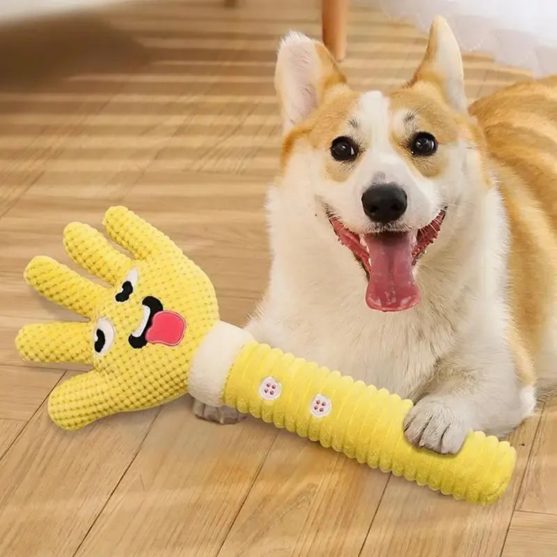 Yellow palm-shaped plush dog teething toy with squeaker for puppies