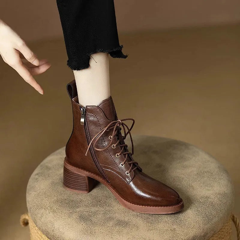 Women's black pointed-toe ankle boots with 5.5cm heel and artificial PU leather upper