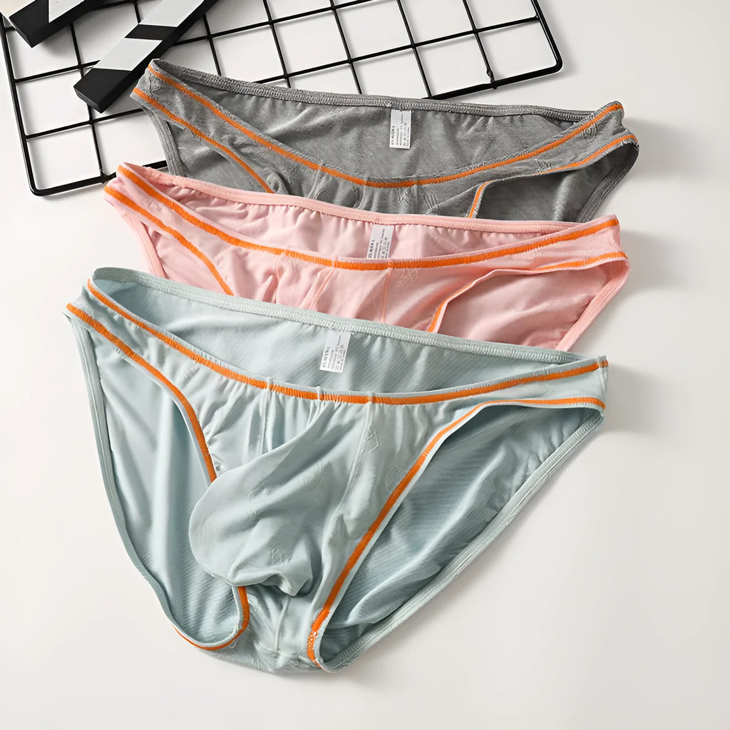 Men's modal butt-lift underwear in ice silk knit, showing colour options: dark gray, pink, yellow green, blue, sky blue.