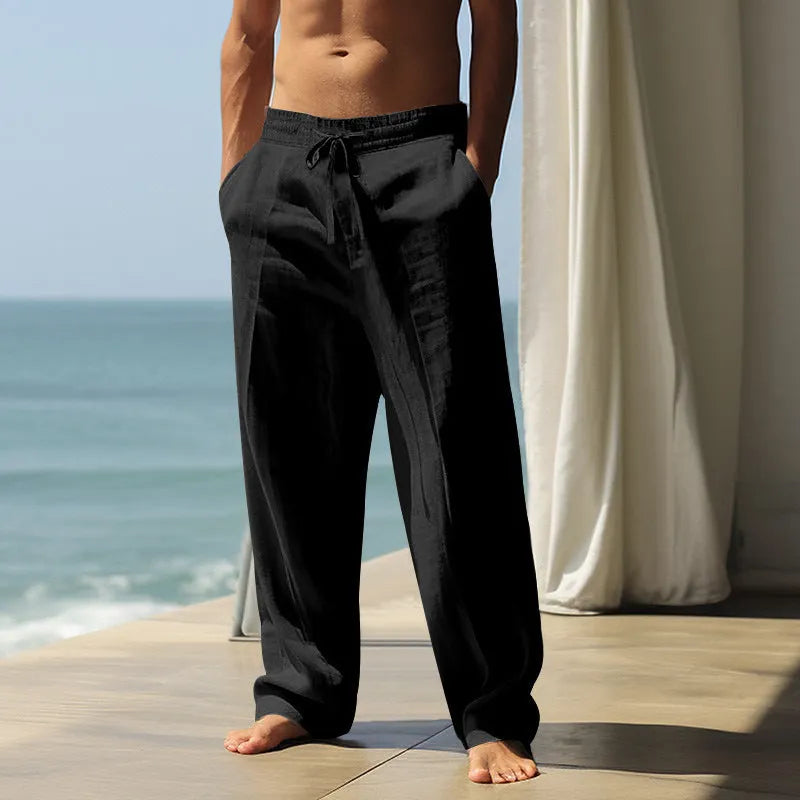 Men's solid colour casual cotton trousers in gray shown on a model.