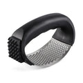 304 stainless steel garlic press 11x7cm in modern simple design on a kitchen counter