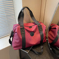 Oxford cloth travel bag in black with 36-55 litre capacity showing breathable back panel and organisational compartments