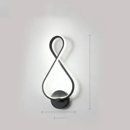 Nordic minimalist LED wall lamp with silicone shade for bedside use, black finish