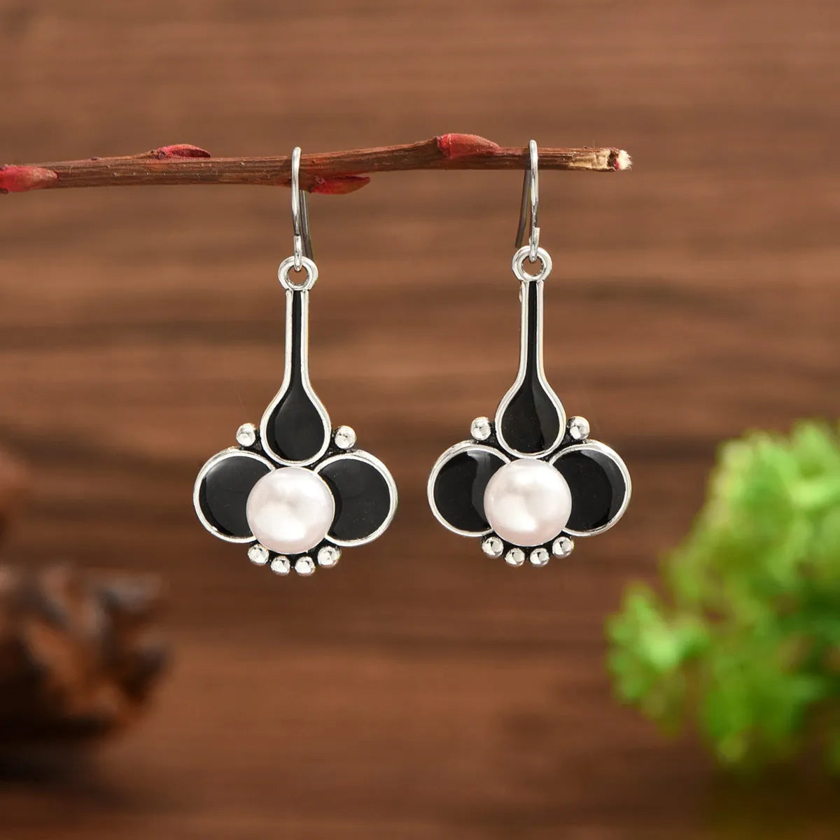 Silver retro fashion earrings with electroplated finish and alloy construction
