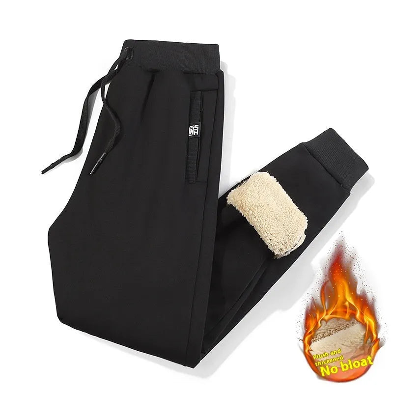 Men's grey fleece-lined cotton track pants with elastic waist and straight leg