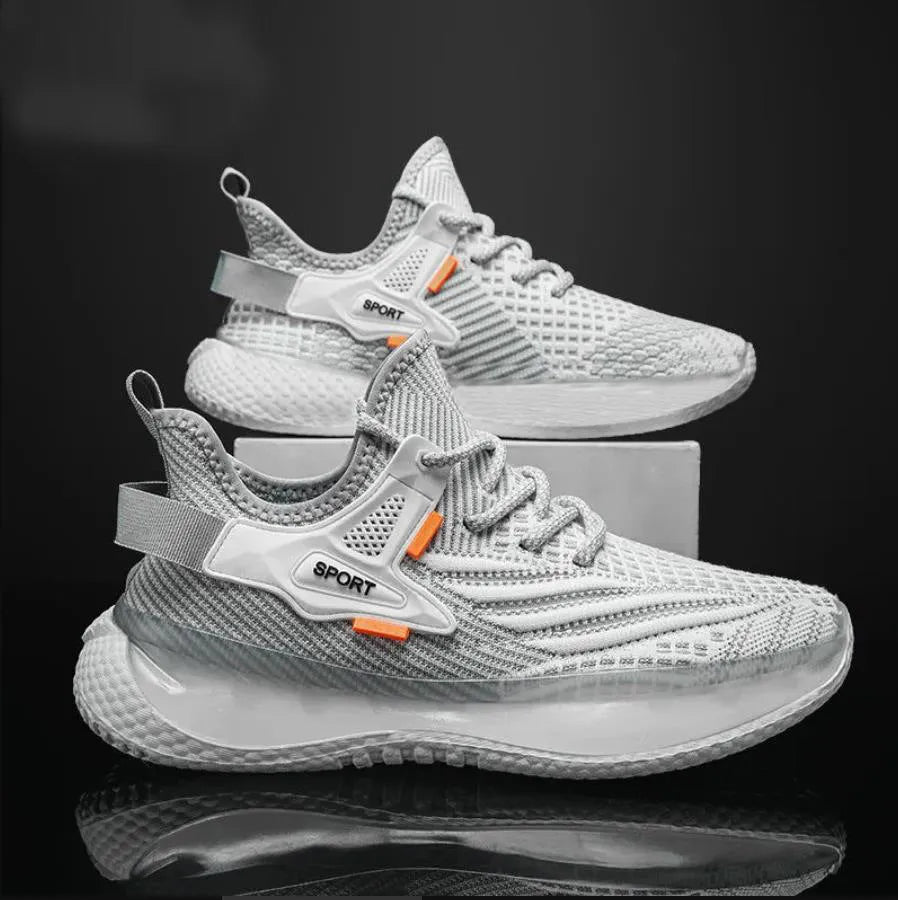 Men's casual sneaker with woven mesh upper in black colour showing round toe and lace-up design