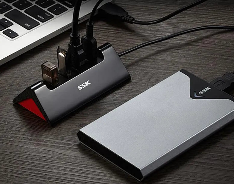 Black ABS 4-port USB expansion dock with USB 3.0 and USB 2.0 interfaces and cable