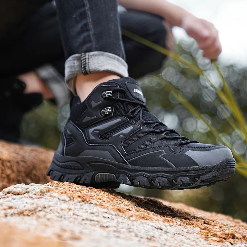 High-top hiking sneakers in multiple colours with lace-up front and rubber sole.