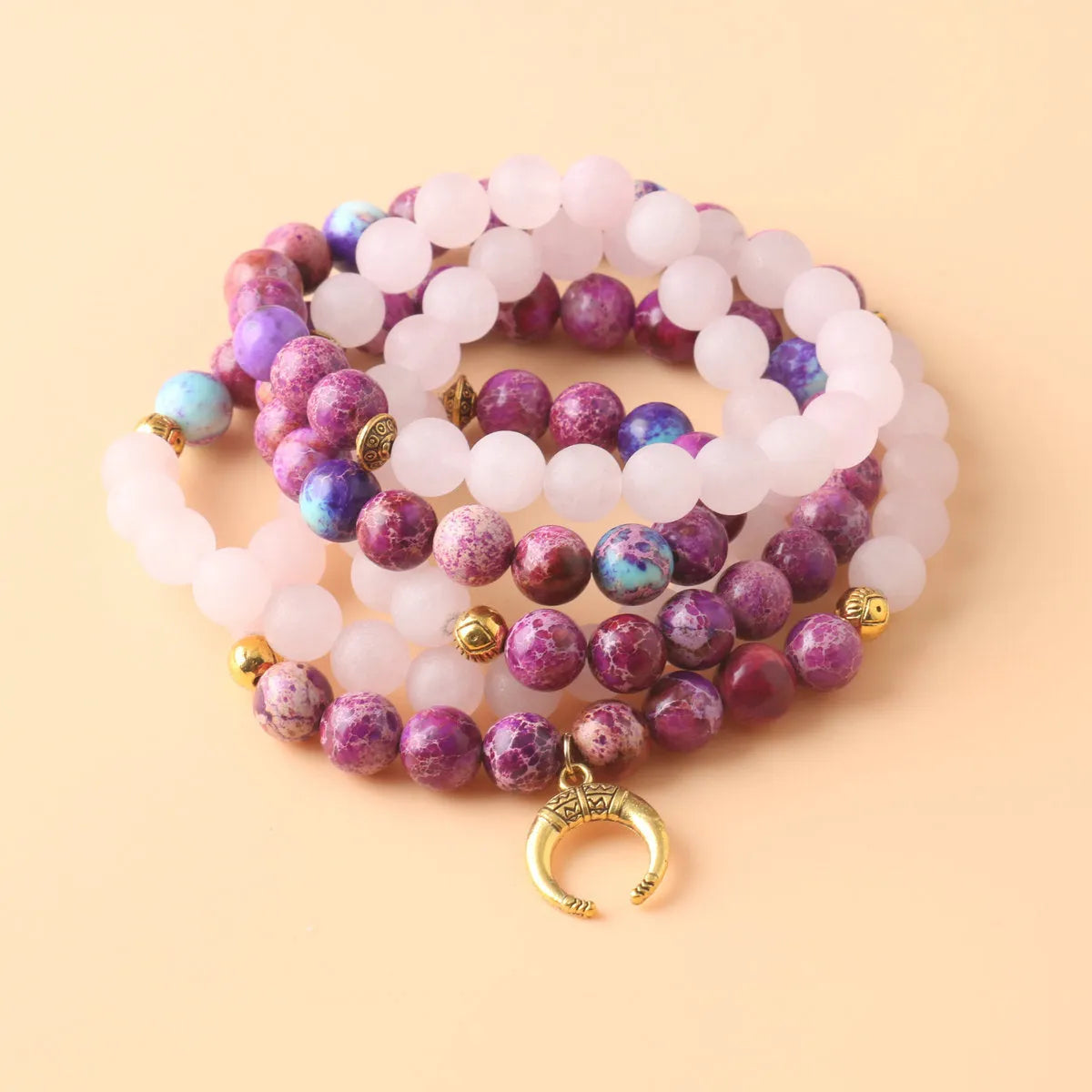 Pink crystal Emperor Stone round pendant necklace on a casual chain