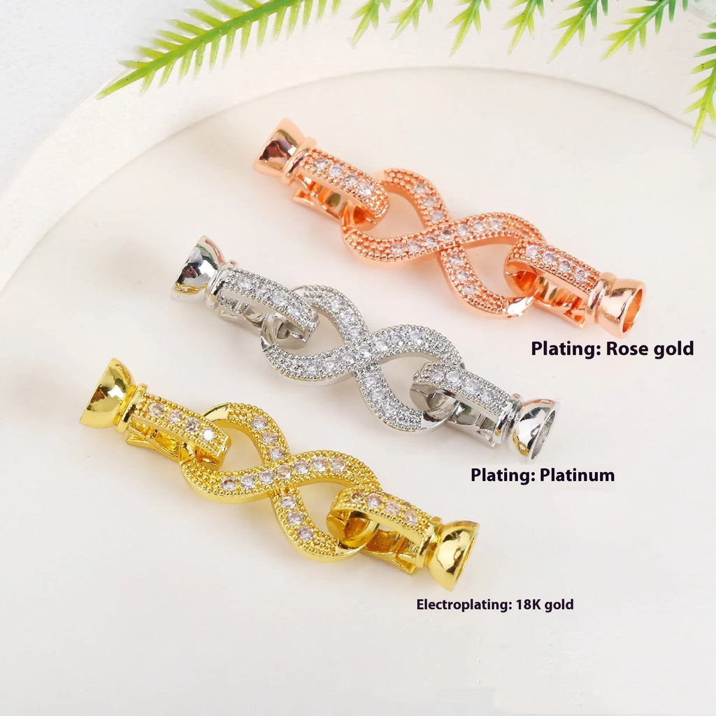 Small gold-coloured jewellery clasp and end hook for DIY necklace or bracelet making and repair.