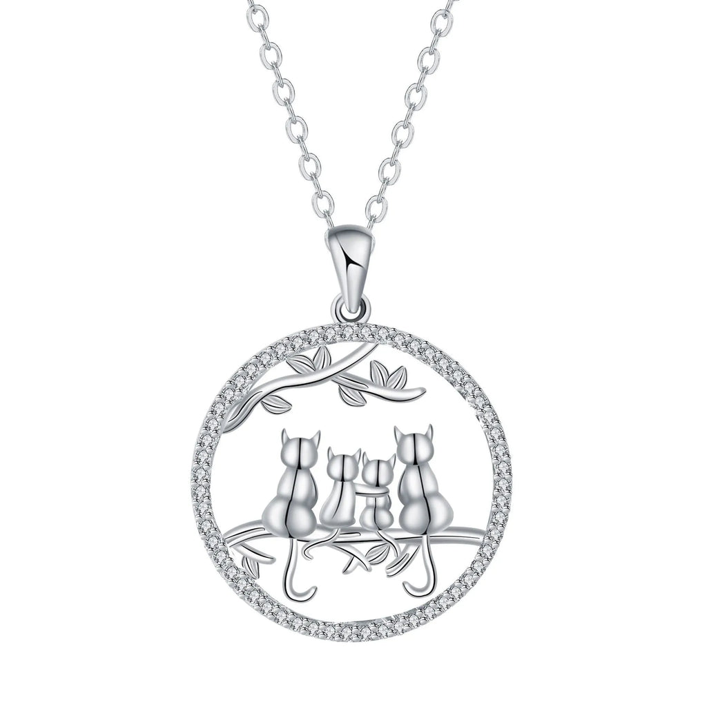 Women's copper necklace with four cat kitten pendants on cross chain, electroplated finish.
