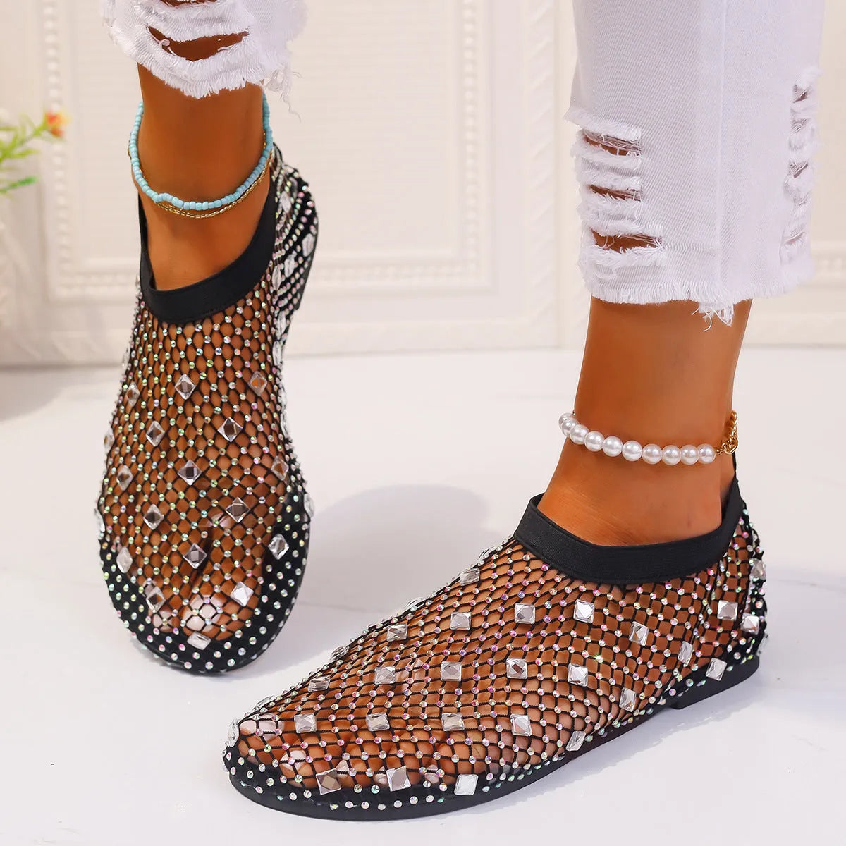 Women's flat mesh sandals with colourful rhinestone decoration on heel strap