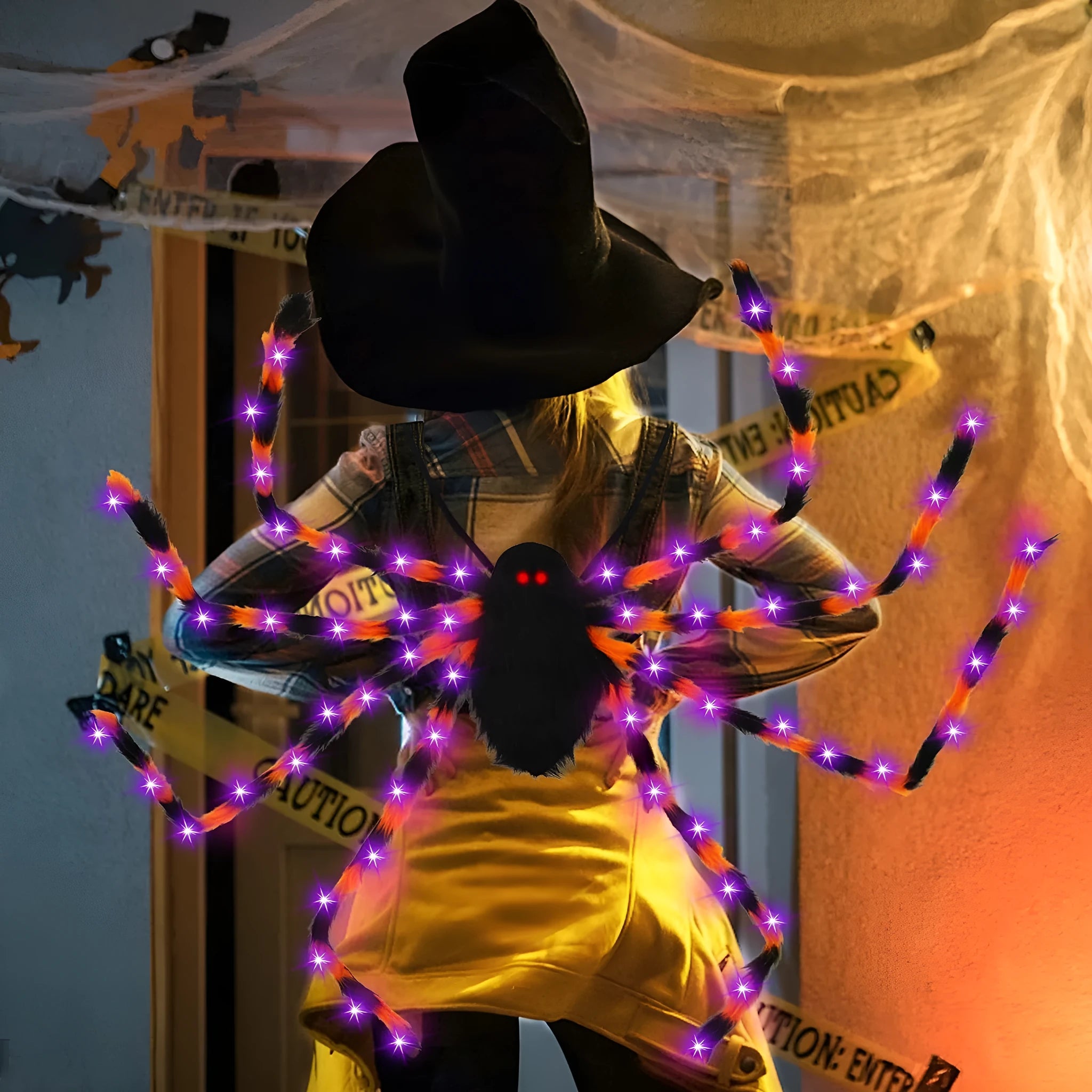 Halloween spider backpack with LED lights in orange purple glow colour showing backpack straps and spider design