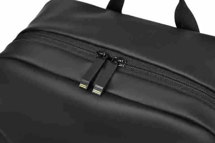 Waterproof PU leather men's backpack in black, blue and grey colour options showing large capacity design