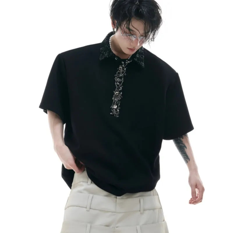 Men's black loose fit polo shirt with square collar and embroidery sequins detail on chest