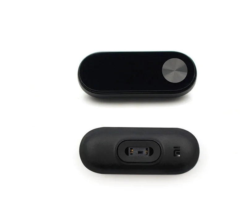 Xiaomi Mi Band 2 black fitness tracker with OLED screen on an adjustable thermoplastic elastomer wrist strap.