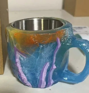 400ml resin coffee mug with handle in a choice of colours including blue, purple, and rock pattern.