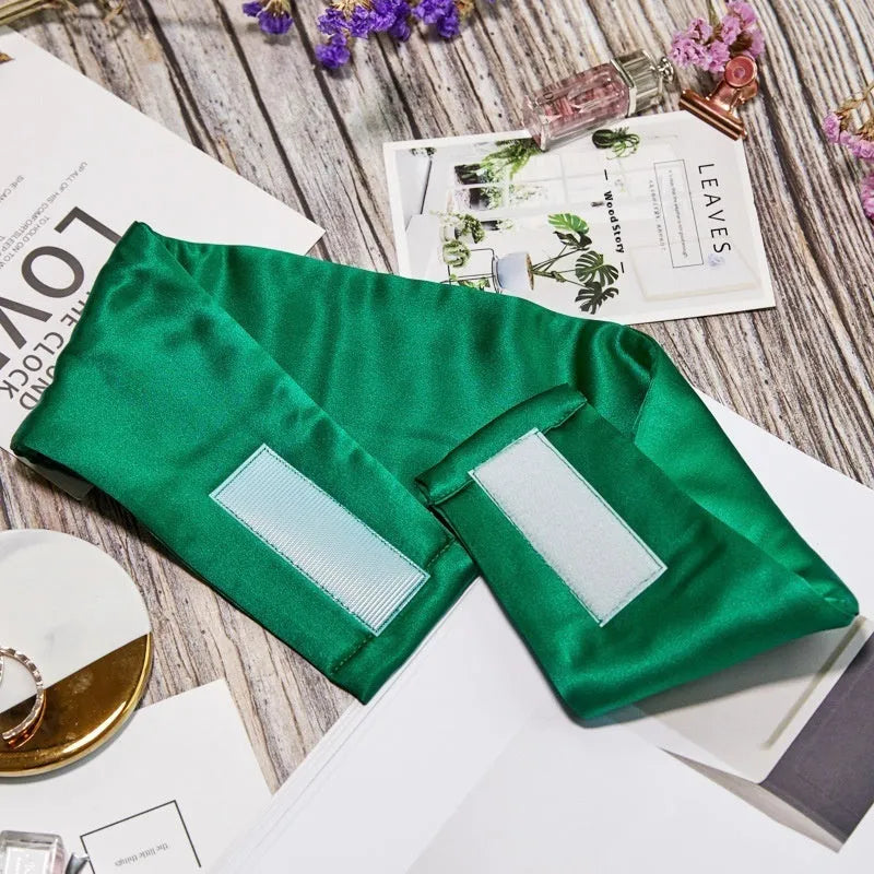 Mulberry silk sleep eye mask shown in one of seven colours: black, champagne gold, green, navy, pink, silver grey, or white.