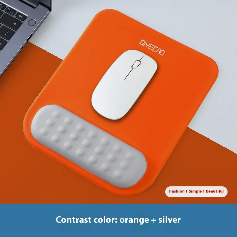 Ergonomic cloth silicone mouse pad with built-in wrist rest in a choice of colours.