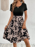 Women's printed A-line dress with lace-up design and shoulder straps in khaki colour