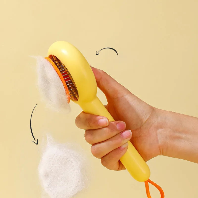 Yellow duck-shaped pet comb with open-section design and floating needle teeth for cat and dog grooming