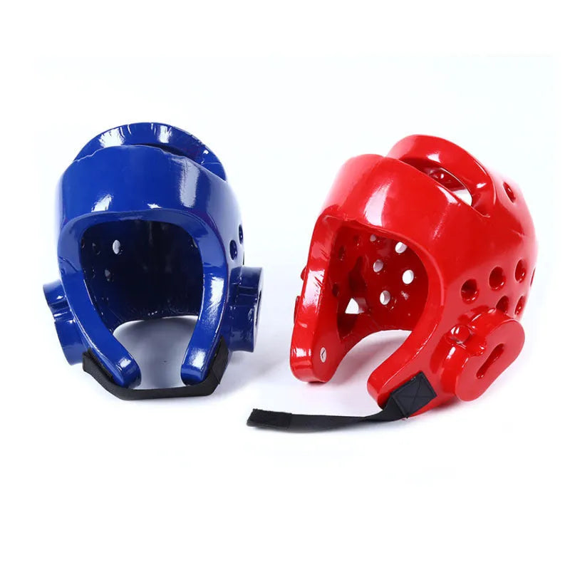 Blue karate protective gear set showing PU leg guard, helmet, and boxing gloves on a grey background.