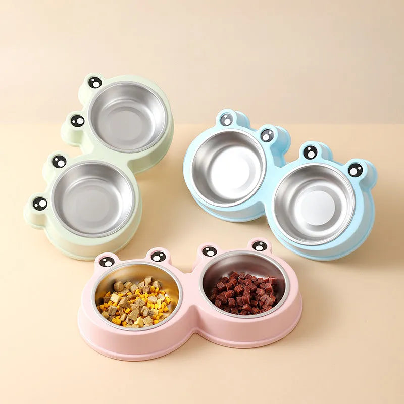 Blue double compartment pet feeding bowl with stainless steel frog-shaped water bowl attached.