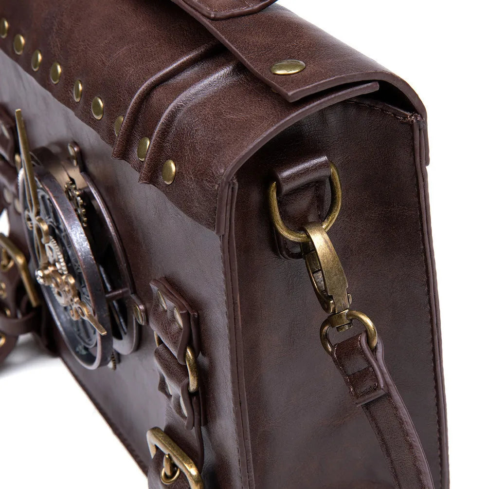 Bronze steampunk shoulder bag with metal detailing and horizontal pillow shape