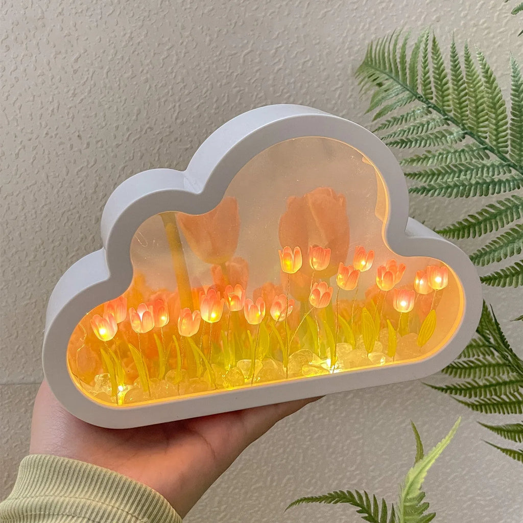 Tulip night lamp DIY kit with pink cloud tulip LEDs and mirror face on a desk