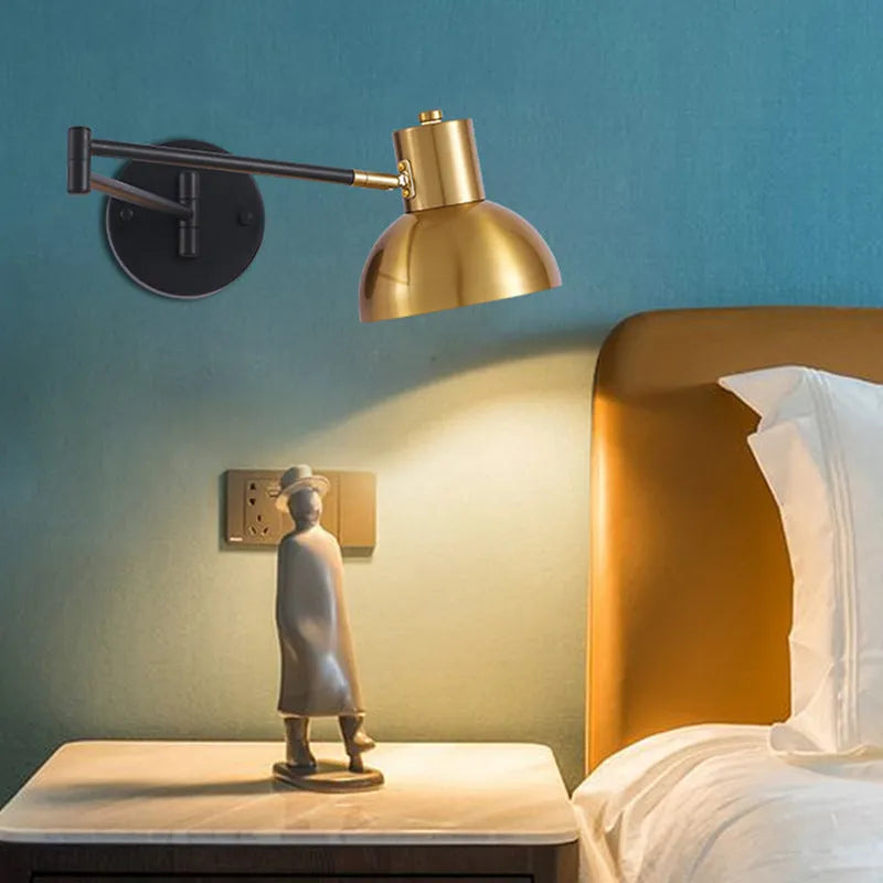 Modern minimalist double-section rocker arm wall lamp mounted on a wall, showing adjustable joints.