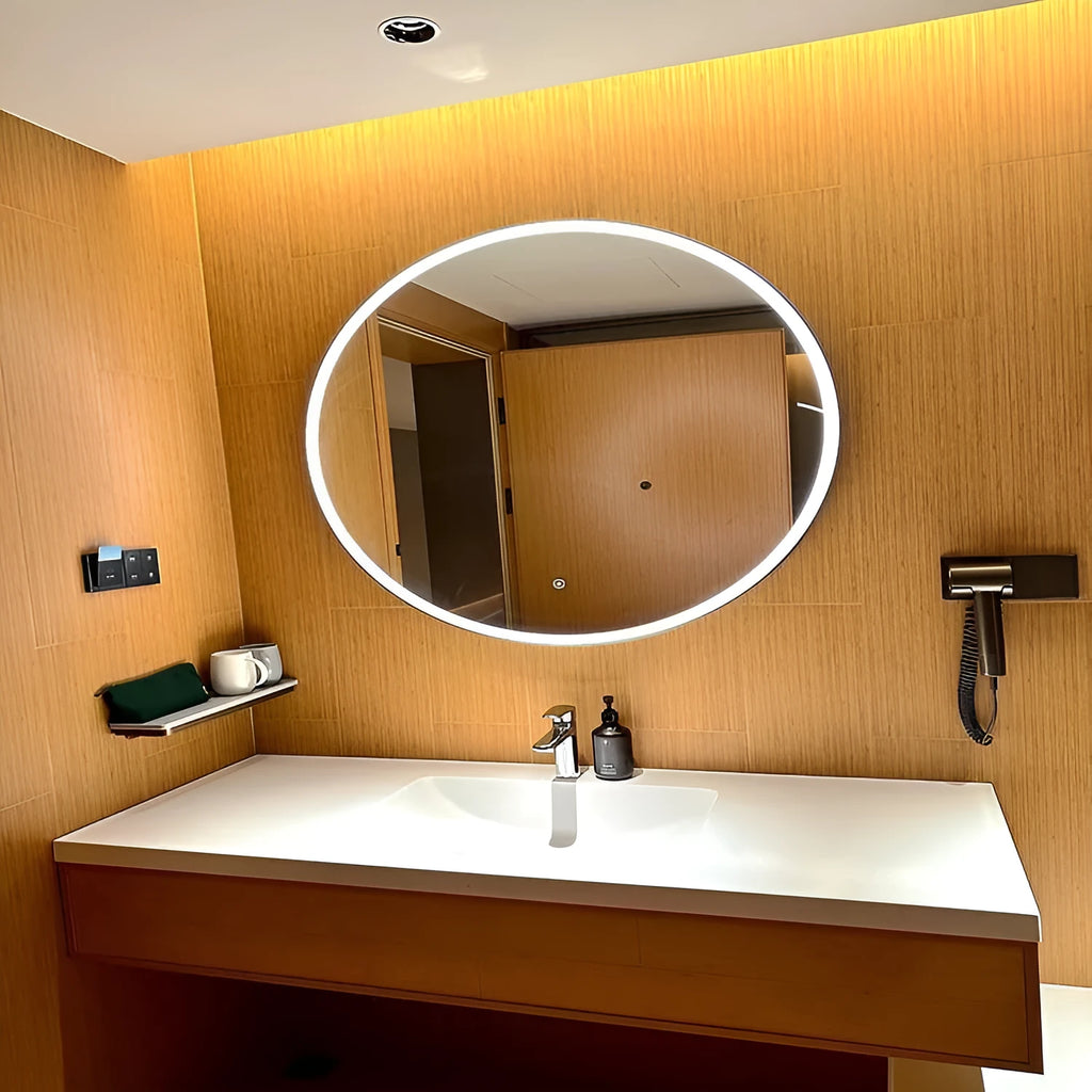 Round black aluminum alloy framed LED bathroom makeup mirror mounted on wall with touch control.