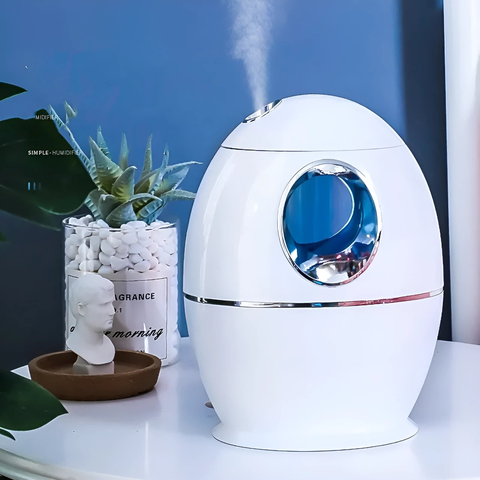 White columnar household mute air disinfection humidifier with single fog outlet on a wooden table