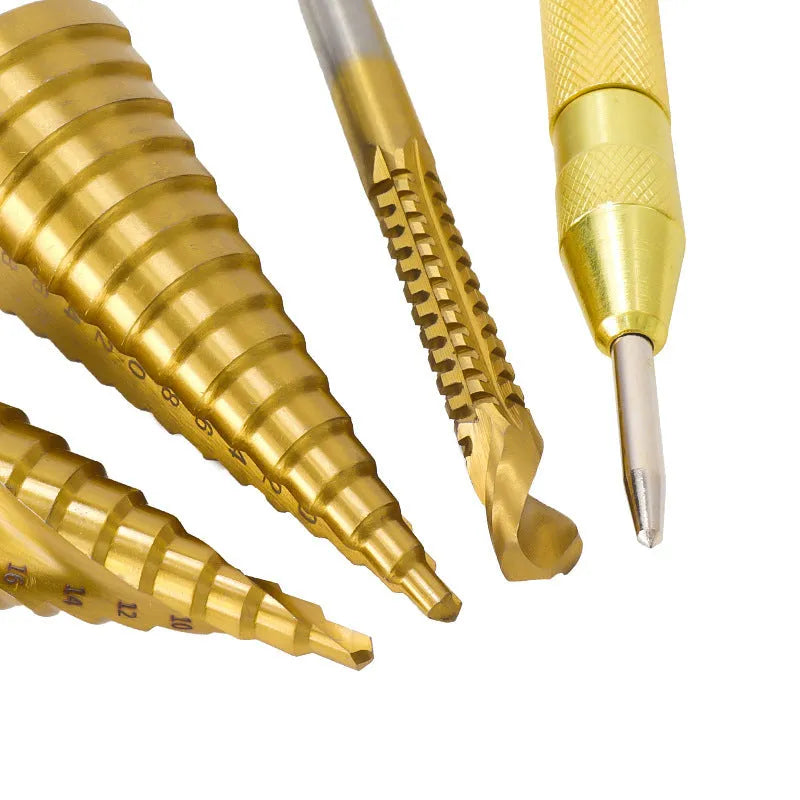High speed steel cone step drill bit and centre punch set for metalworking.