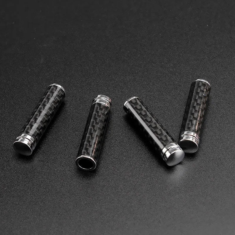 Set of four carbon fibre and metal car door handle decorative replacement covers.