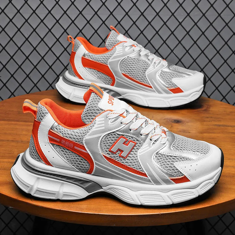 Men's white and gray mesh casual running shoes with a round toe and injection moulded plastic sole.