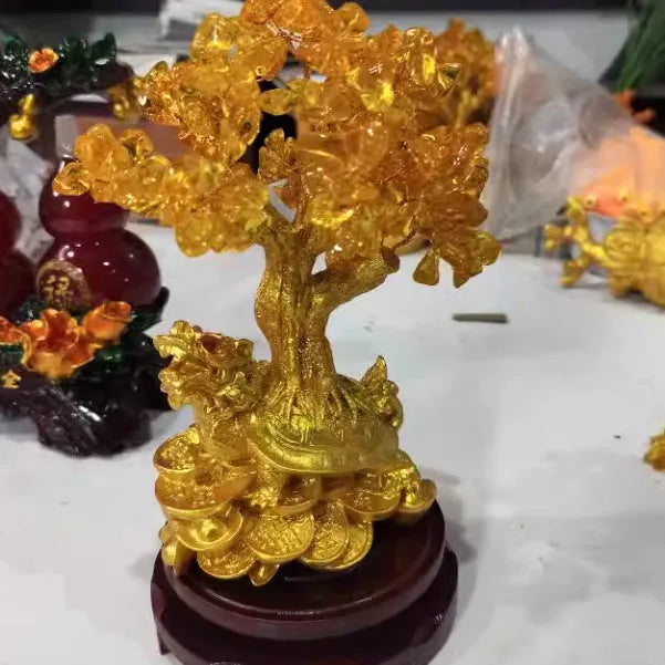 Citrine coloured resin Feng Shui money tree ornament with small water turtle design