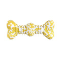 Green, white, and yellow camouflage pattern natural rubber dog chew toy for large breeds.
