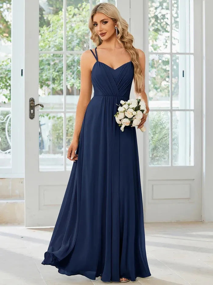Women's sleeveless long banquet dress with pleated A-line skirt in light green, wine red, navy blue, or purple.