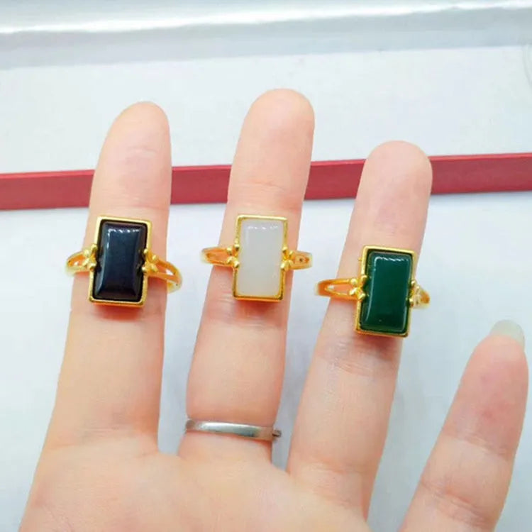 Adjustable brass ring with gold-plated finish and electroplated gemstone inlay
